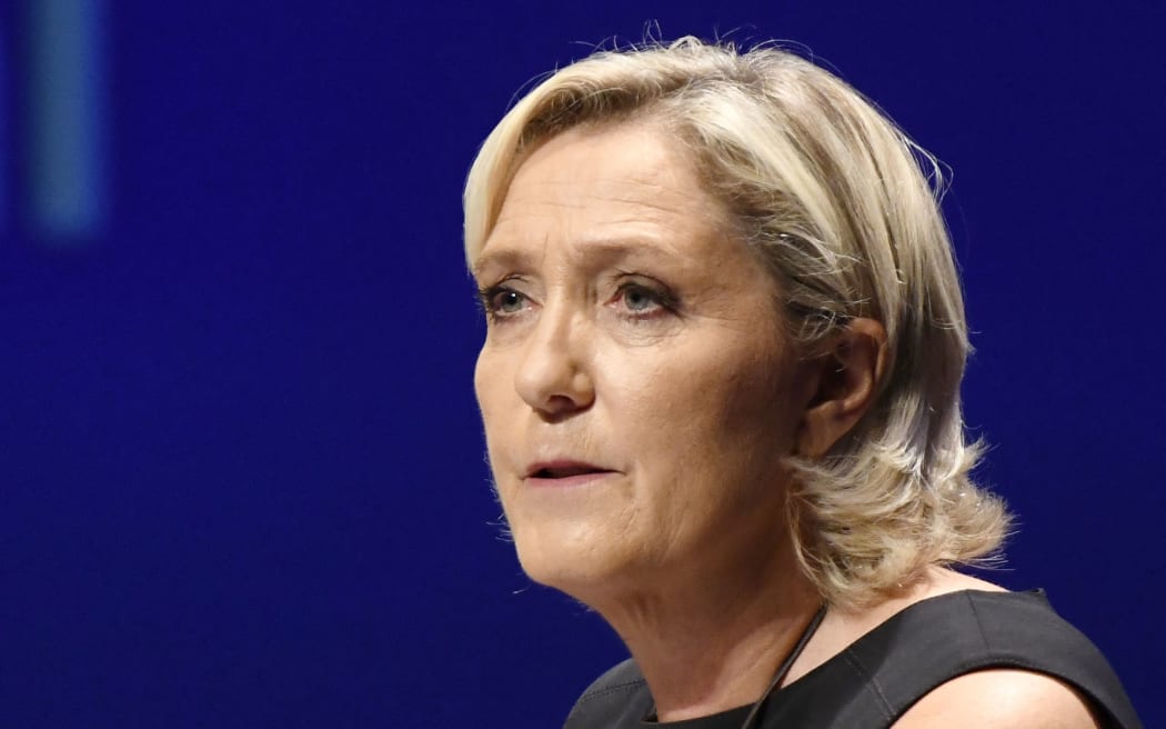 Leader of France's Rassemblement National (RN) far-right political party Marine Le Pen delivers a speech at a meeting in Fréjus, southern France on September 16, 2018.