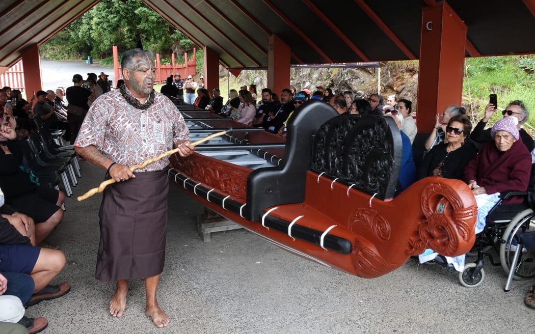Bernard Makoare blesses the new waka, named Hinepāpara.