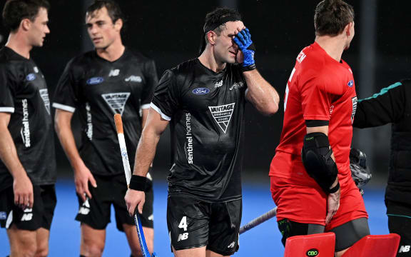 Dane Lett of New Zealand dejected after the match.