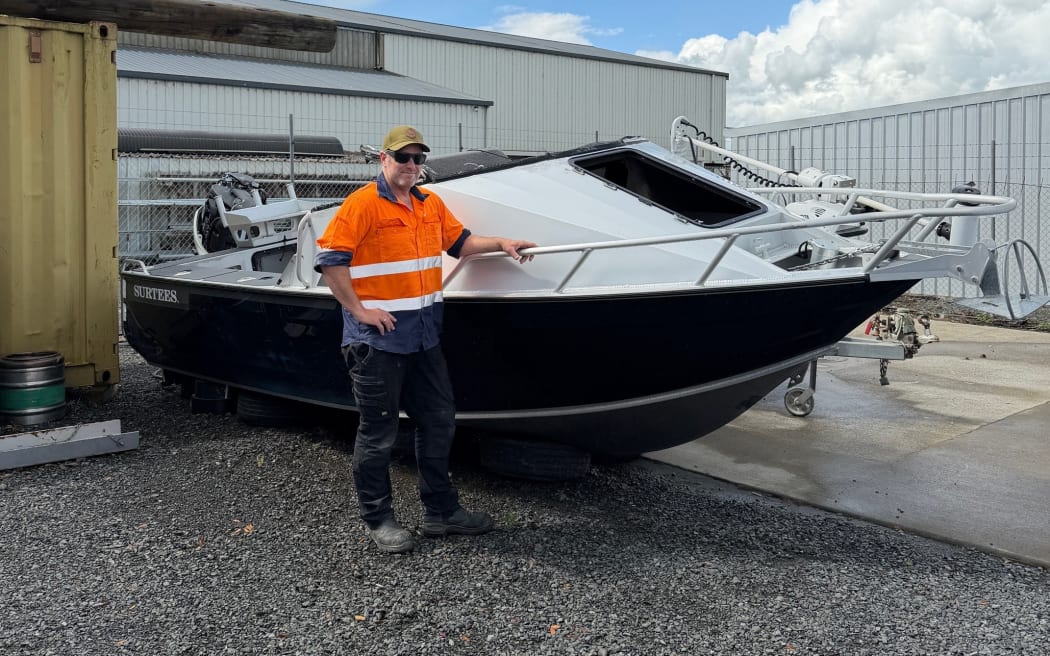 Darren Teague and his boat that capsized on the Raglan Bar on 1 November.