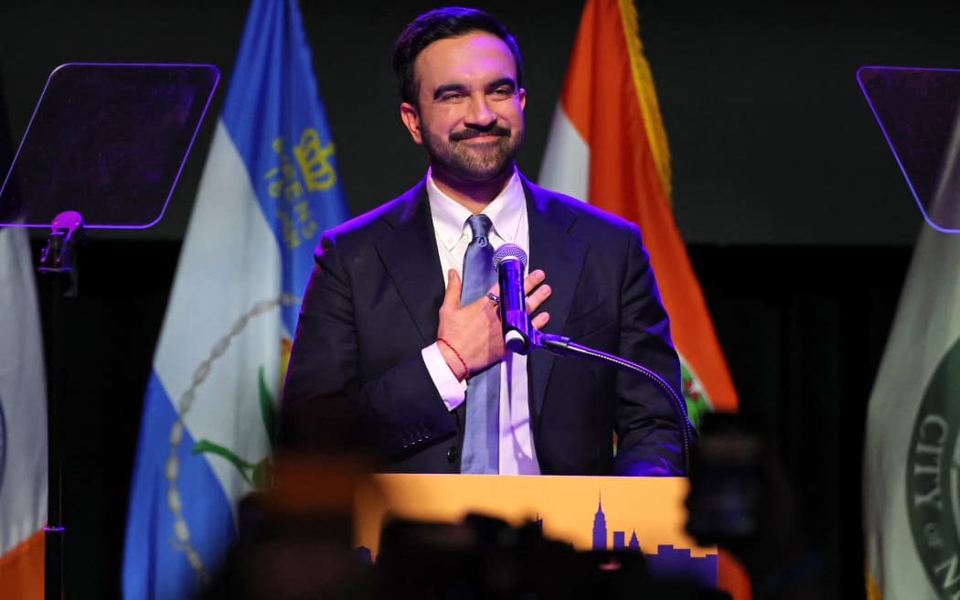New York City Mayoral candidate Zohran Mamdani celebrates during an election night event at the Brooklyn Paramount Theater in Brooklyn, New York on November 4, 2025. New Yorkers elected leftist Zohran Mamdani as their next mayor November 4, 2025 broadcasters projected, on a day of key local ballots across the country offering the first electoral judgement of Donald Trump's tumultuous second White House term. (Photo by ANGELA WEISS / AFP)