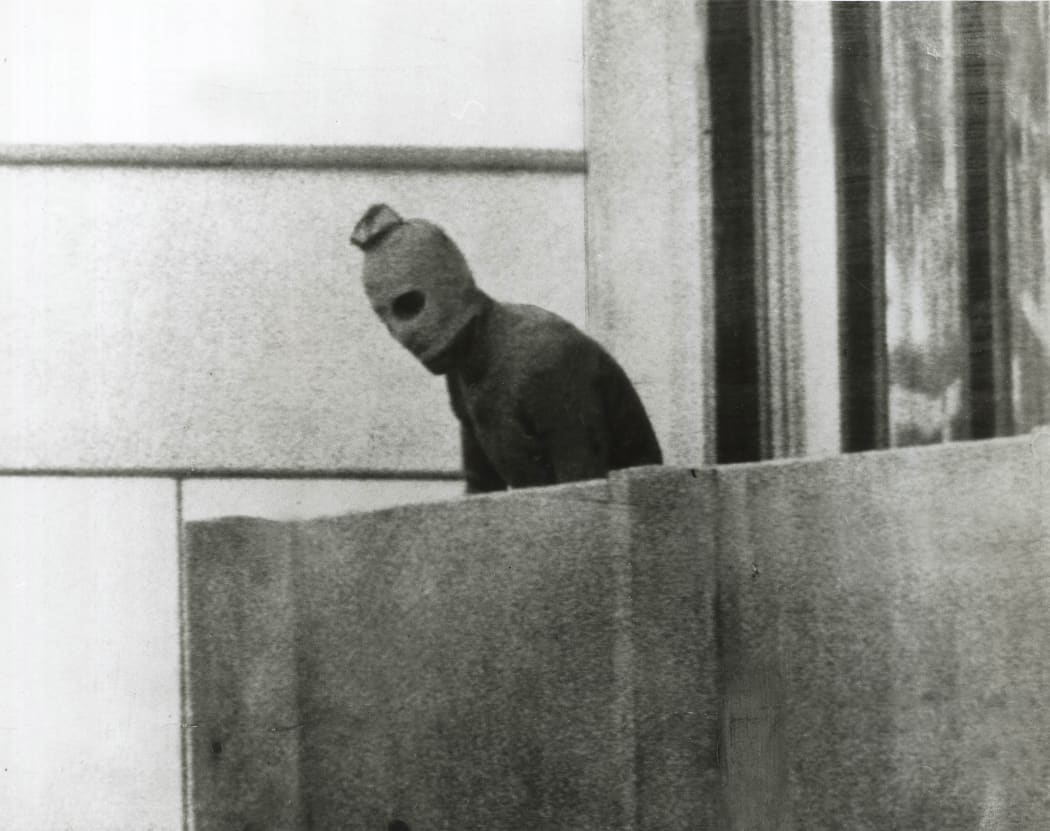 A Fairfax photographer captured one of the defining images of the Munich Olympics in 1972. This Palestinian is one of a group that had taken 12 Israeli athletes hostage.