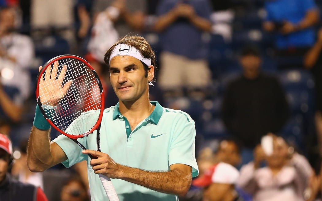 Roger Federer celebrates as he reaches the Rogers Cup semi-finals