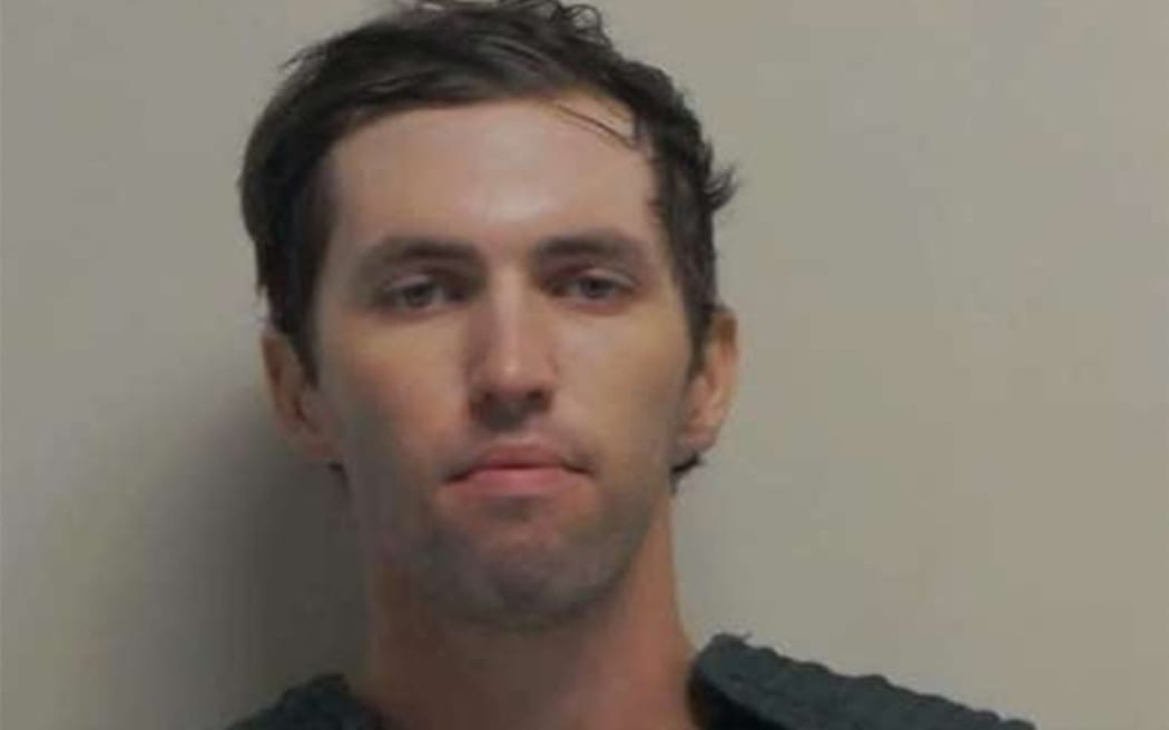 This handout released by the Utah Governor's Office on September 13, 2025 shows the booking photo of Tyler Robinson, the suspect in the shooting death of right-wing activist Charlie Kirk. Authorities announced on September 12 that they had taken into custody Tyler Robinson, the person believed to have assassinated Charlie Kirk, a right-wing activist and close ally of President Donald Trump. He was shot while speaking at an event on September 10 at Utah Valley University (UVU), in the city of Orem, Utah.