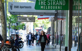 People are seen walking along Elizabeth Streeth on February 18, 2021 in Melbourne, Australia.