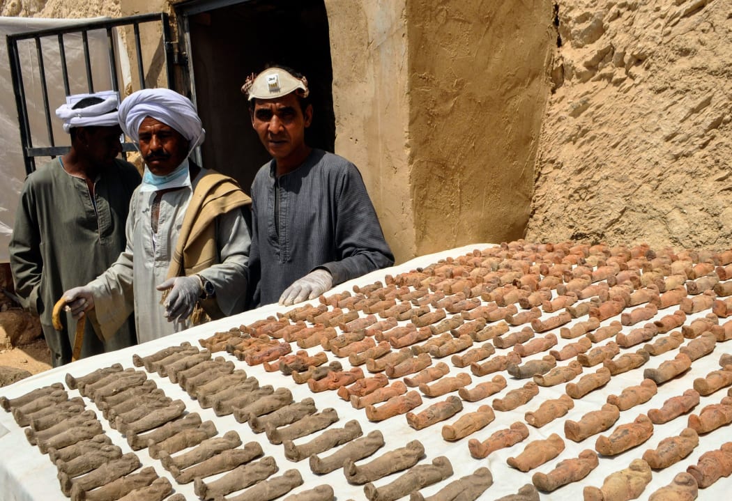 The sculptures which were found with mummies and sarcophagus inside a grave, which is estimated about more than 3500 years old, during archaeological works at Dra' Abu el-Naga' region, are on display in Luxor, Egypt on April 18, 2017.