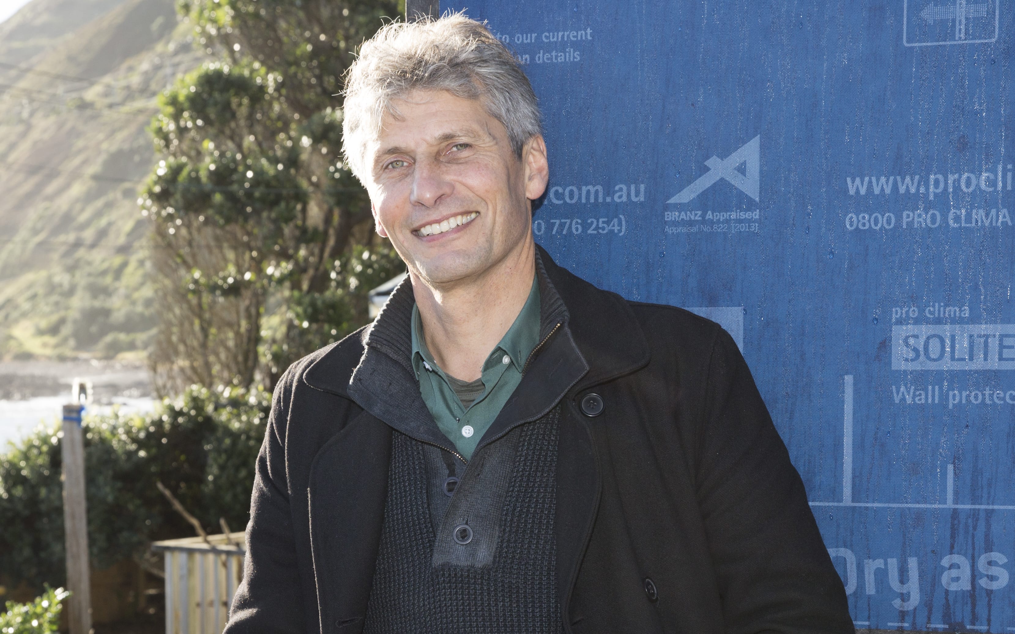 Chris Moller in front of the Wellington "Stilt House"
