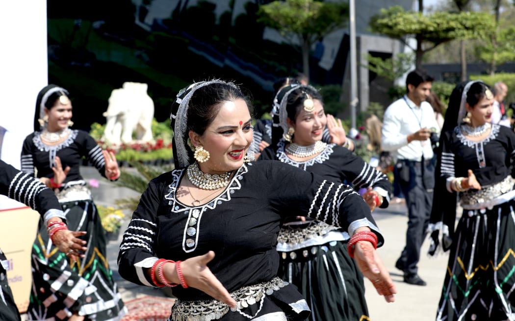 Dancers welcome the Prime Minister at Palam Air Force Station in New Delhi.