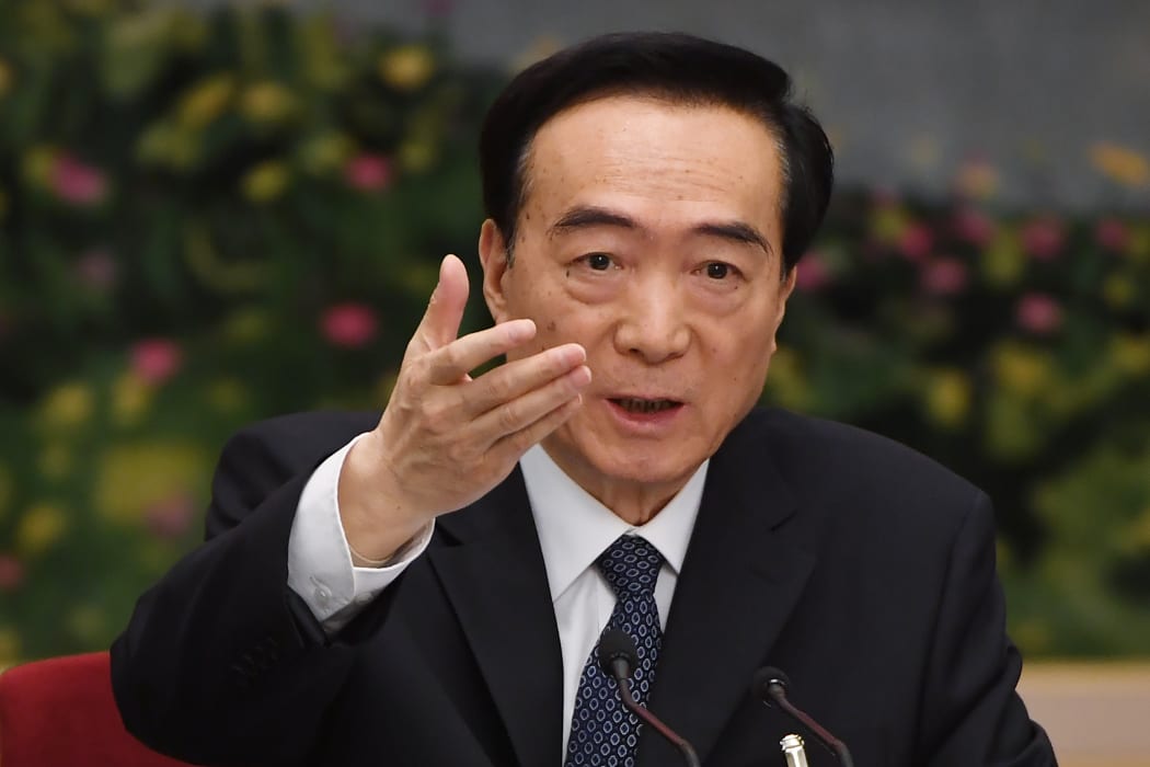 Xinjiang Party Secretary Chen Quanguo speaks during a meeting of the Xinjiang delegation at the ongoing National People's Congress in Beijing on March 12, 2019.
