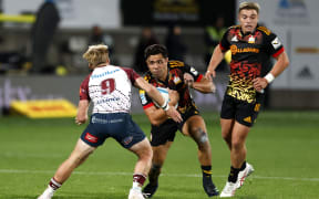 NEW PLYMOUTH, NEW ZEALAND - MAY 12: Anton Lienert-Brown of the Chiefs charges forward during the round 12 Super Rugby Pacific match between Chiefs and Queensland Reds at Yarrow Stadium, on May 12, 2023, in New Plymouth, New Zealand. (Photo by Andy Jackson/Getty Images)