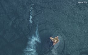 A possible missile streak attack on a landing craft near Ukraine-owned Snake Island in the Black Sea near the Danube Delta on May 12, 2022.