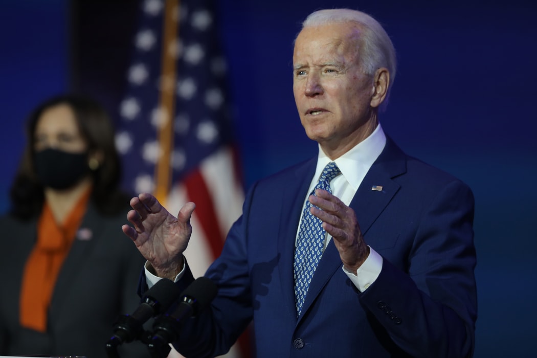 President-elect Joe Biden speaks to the media while flanked by Vice President-elect Kamala Harris, after receiving a briefing from the transition COVID-19 advisory board on November 09, 2020.