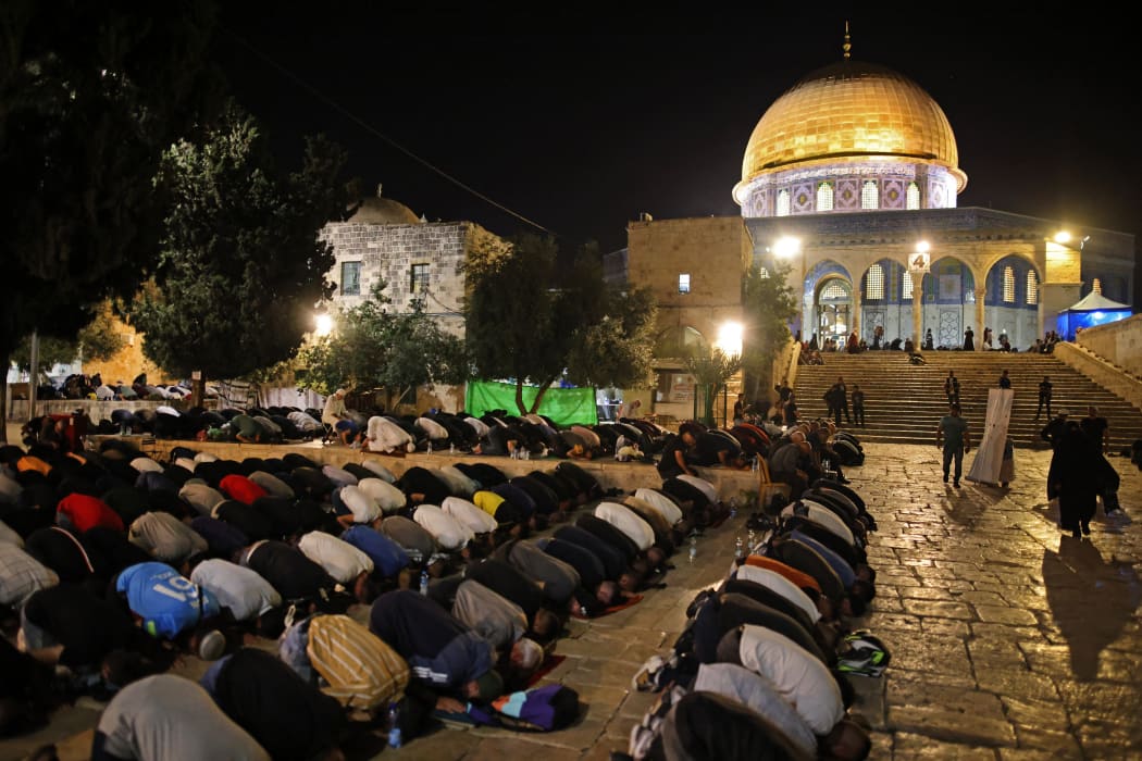 Palestinians pray outside Jerusalem's Al-Aqsa Mosque during the holy Night of Destiny, Laylat al-Qadr.