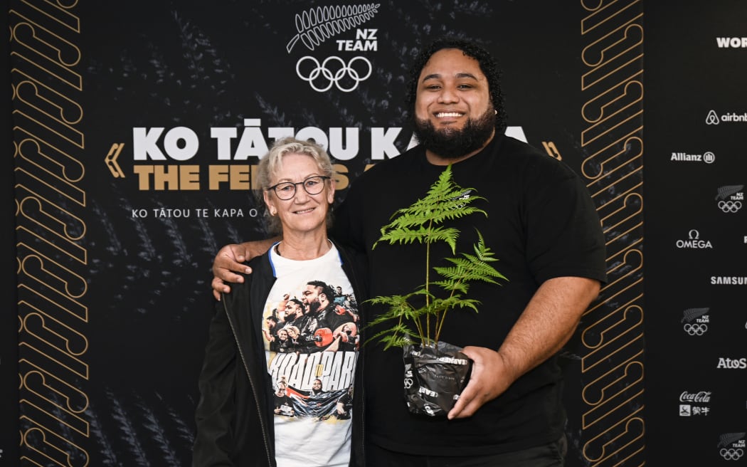 Olympic Weightlifter David Liti and his coach Tina Ball.