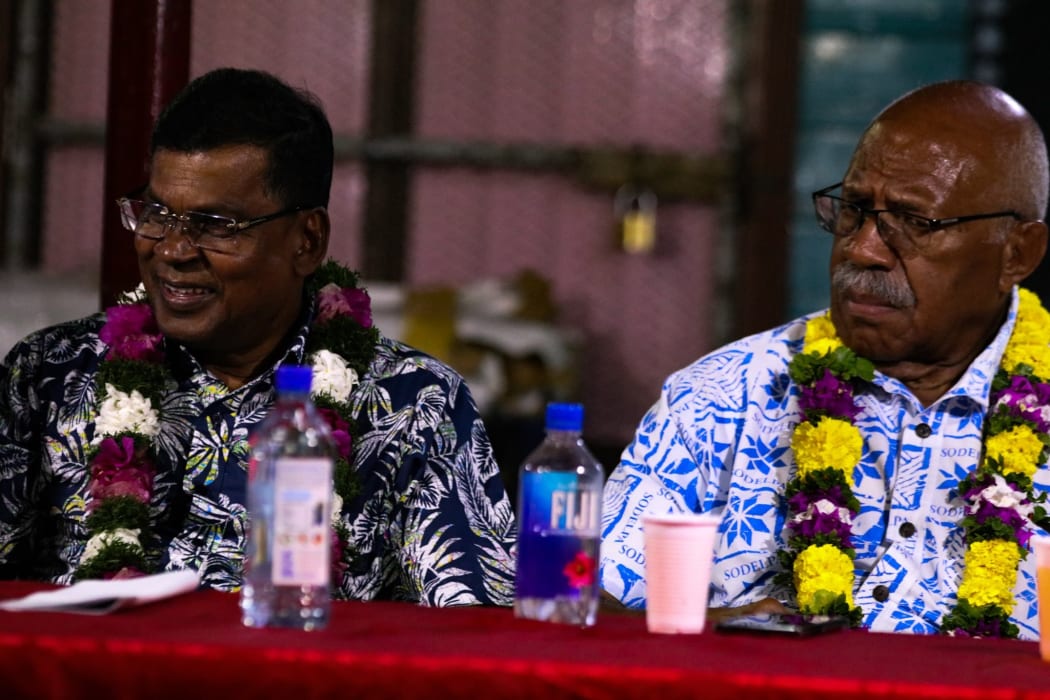 Leader of the National Federation Party Biman Prasad, left, and SODELPA leader Sitiveni Rabuka.