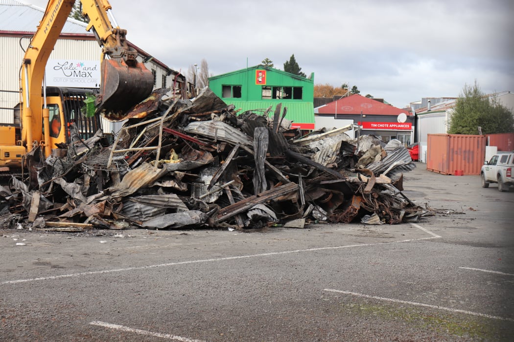 The demolition begins at the fire ravaged building, which Four Square leases along with Lulu and Max out-of-school care.