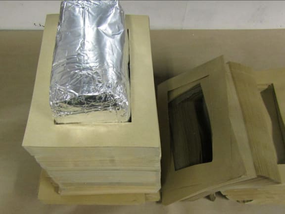 Drugs concealed and declared as paper packaging.