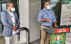 Papua new Guinea's Health Secretary, Osborne Liko (left) and National Pandemic Response Controller David Manning address a media update about the country's worrying Covid-19 surge, 27 March, 2021, Port Moresby.