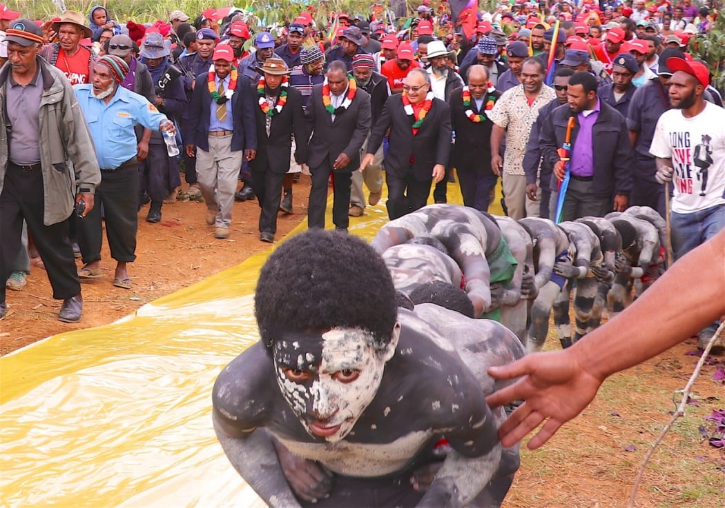 Papua New Guinea prime minister Peter O'Neill (centre with glasses) on the campaign trail in Southern Highlands, May 2017.