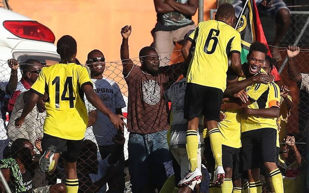 Vanuatu's Godine Tenene celebrates his goal against Fiji.