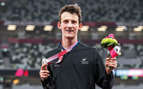 William Stedman (NZL) with his silver medal in the Men's Long Jump