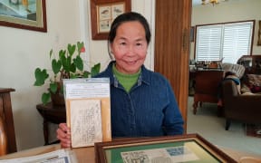 Jennifer Dalgleish holding her grandfather's diary.