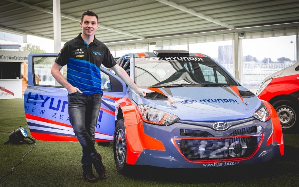 New Zealand rally driver Hayden Paddon with his NZ Hyundai rally car.