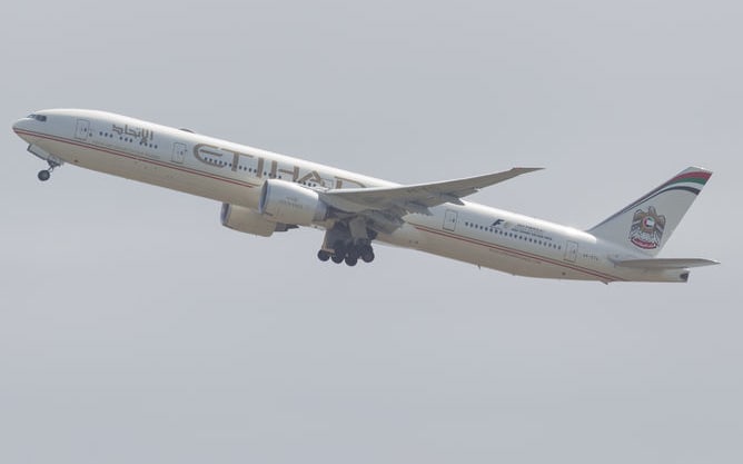 An Etihad Airplane leaves Sydney Airport.