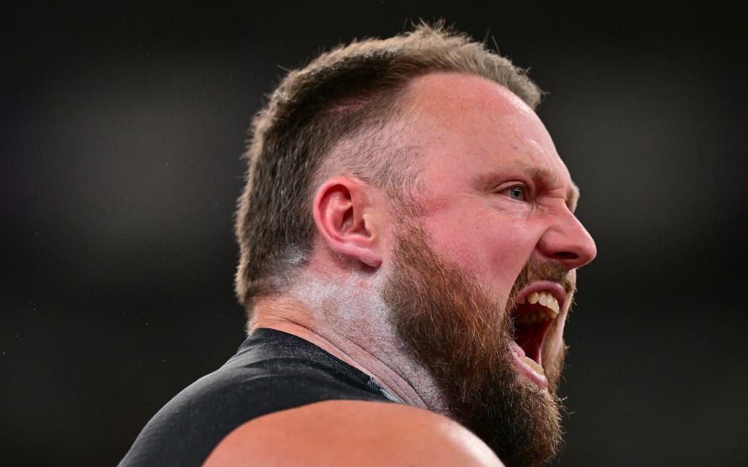 New Zealand's athlete Tom Walsh reacts after an attempt in the men's shot put final during the World Athletics Championships in Tokyo on September 13, 2025. (Photo by Ben STANSALL / AFP)