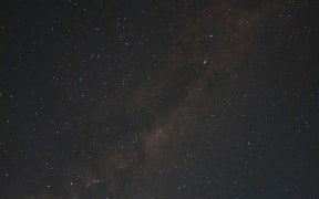 A long exposure shot of the starry night sky and the Milky Way.