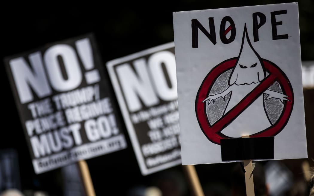 Protestors rally against white supremacy and racism in Columbus Circle on August 13, 2017 in New York City following clashes between white supremacists and counter-protestors in Charlottesville, Virginia.
