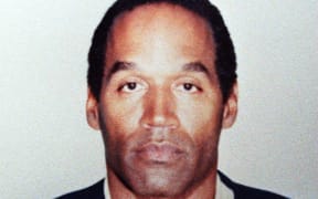 (FILES) This official booking photograph released by the Los Angeles Police Department shows O.J. Simpson as the former professional football star is booked for murder 17 June, 1994. Simpson is charged in the slayings of his ex-wife Nicole Simpson and her friend Ronald Goldman. Simpson has died at the age of 76, his family said on April 11, 2024. (Photo by Handout / Los Angeles Police Department / AFP)