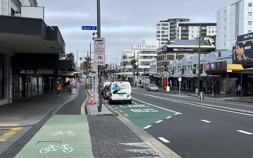 Karangahape Road in central Auckland. The image shows the footpath, cycleway and road.