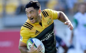 Nehe Milner-Skudder of the Hurricanes runs in a try.