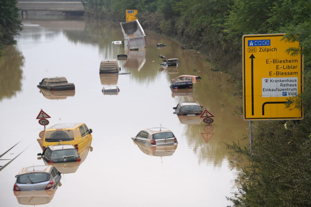 Submerged cars and other vehicles are seen on the federal highway B265 in Erftstadt, western Germany.