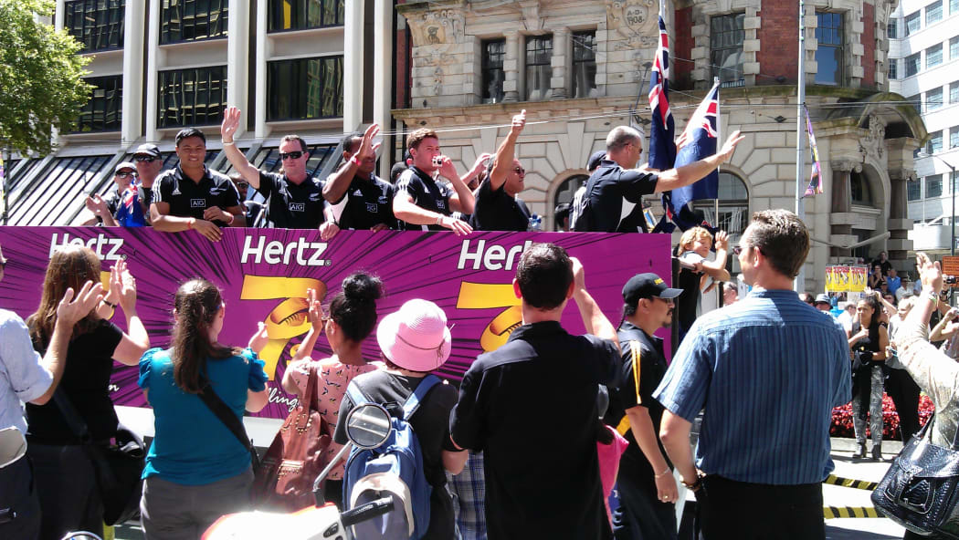 Fans cheer on the New Zealand Sevens team.