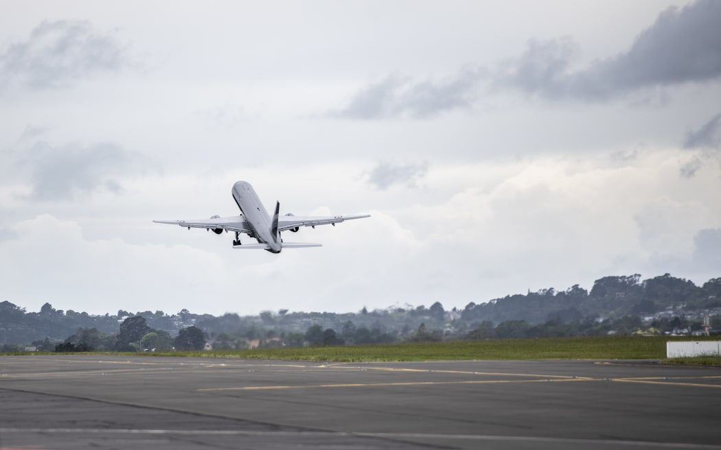 Police and army depart RNZAF Base Auckland for the Solomon Islands on a Royal New Zealand Air Force Boeing 757.