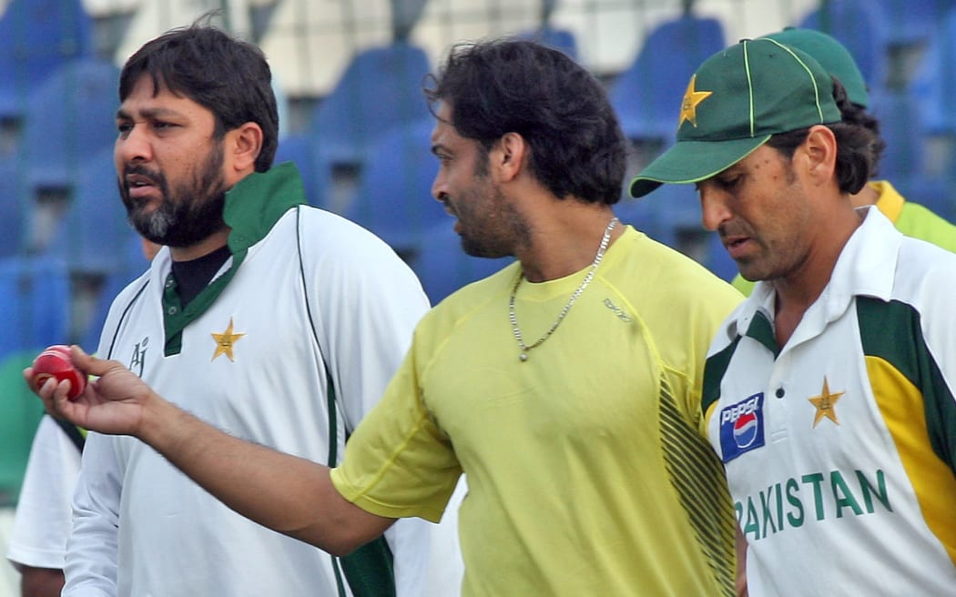 Pakistani cricket team captain Inzamam-ul-Haq, left, with players Younis Khan, right, and Shoaib Akhtar in 2006.