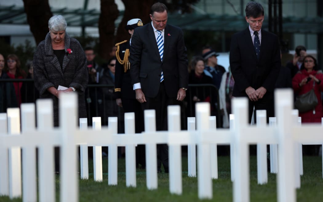 Prime Minister John Key (centre) at the ceremony at Parliament.