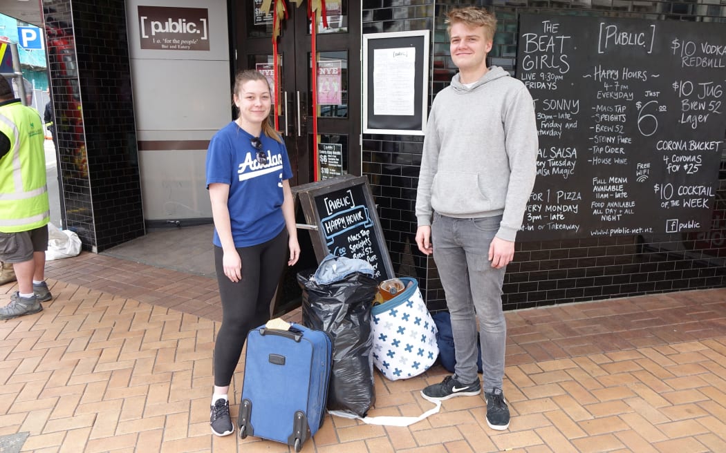 Finn wardle and Hayley Simpson, after grabbing what they could in their short return home.