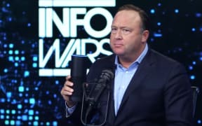 Alex vs Alexa: InfoWars' main man confronts Amazon's in-home online "bugging device."