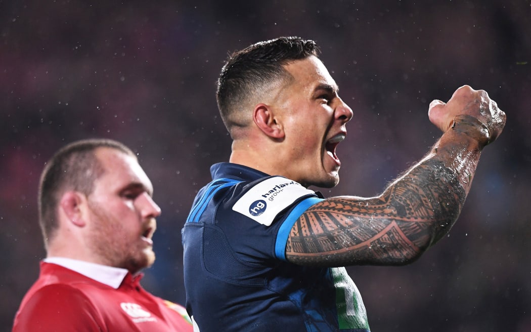 Sonny Bill Williams celebrates his try for the Blues against the Lions.