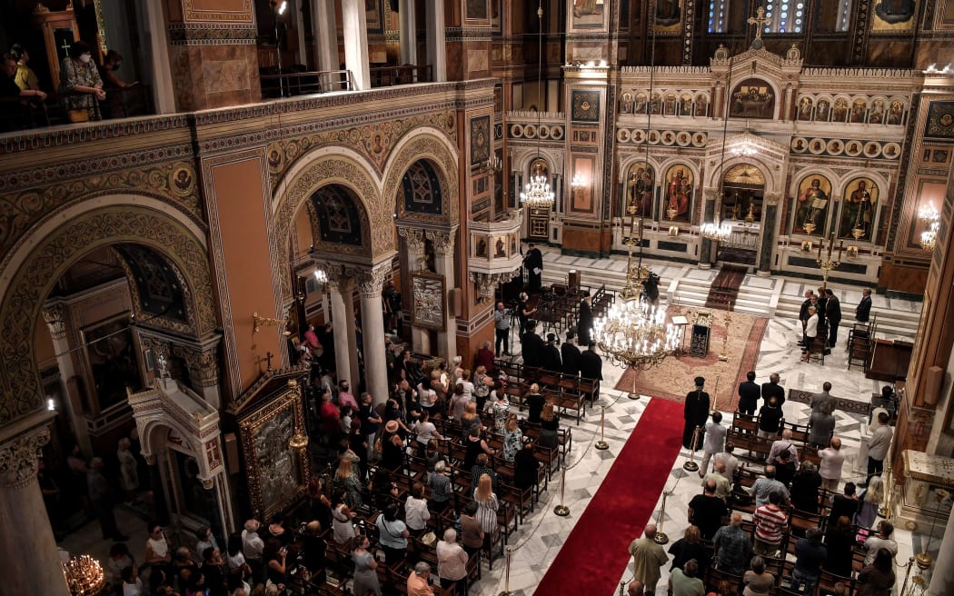 Orthodox faithful attend a special service at Athens Metropolitan Church on July 24, 2020 while Orthodox believers protest against turning the historic Hagia Sophia in Istanbul to a mosque after serving for more than 80 years as museum. -
