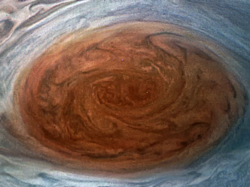 This NASA handout image shows the Great Red Spot on Jupiter taken by the Juno Spacecraft on its flyby over the storm.