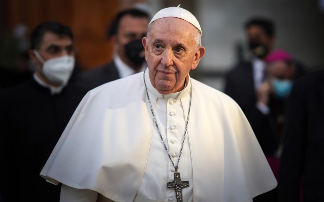 Pope Francis leaves the Syriac Catholic Cathedral of Our Lady of Salvation (Sayidat al-Najat) in Baghdad at the start of the first ever papal visit to Iraq on March 5, 2021.