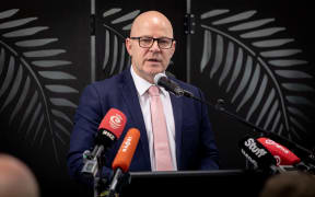 Mental Health Minister Matt Doocey talks to the media about fundings