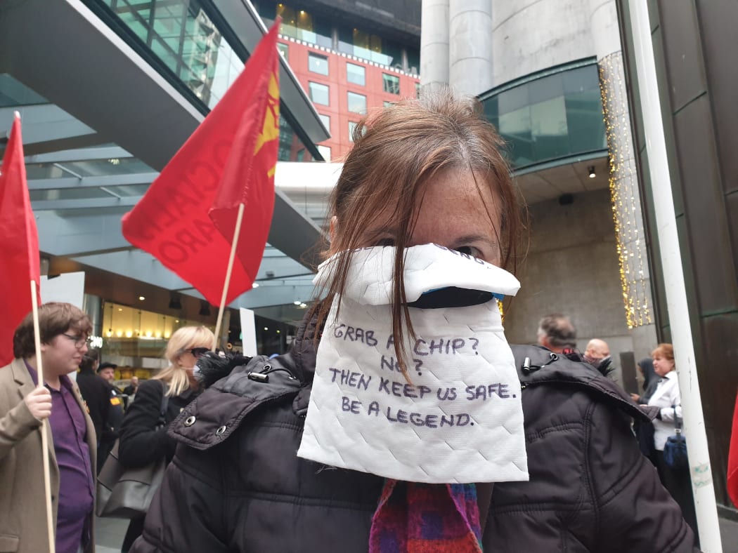 A protester outside SkyCity.