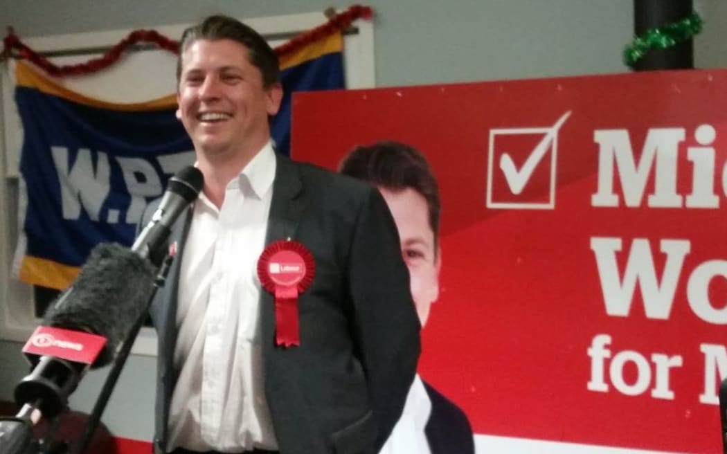 Michael Wood takes the stage after being named the winner of the Mt Roskill by-election.