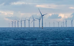 An offshore windmill farm in the Netherlands, producing renewable electric energy. (File photo).