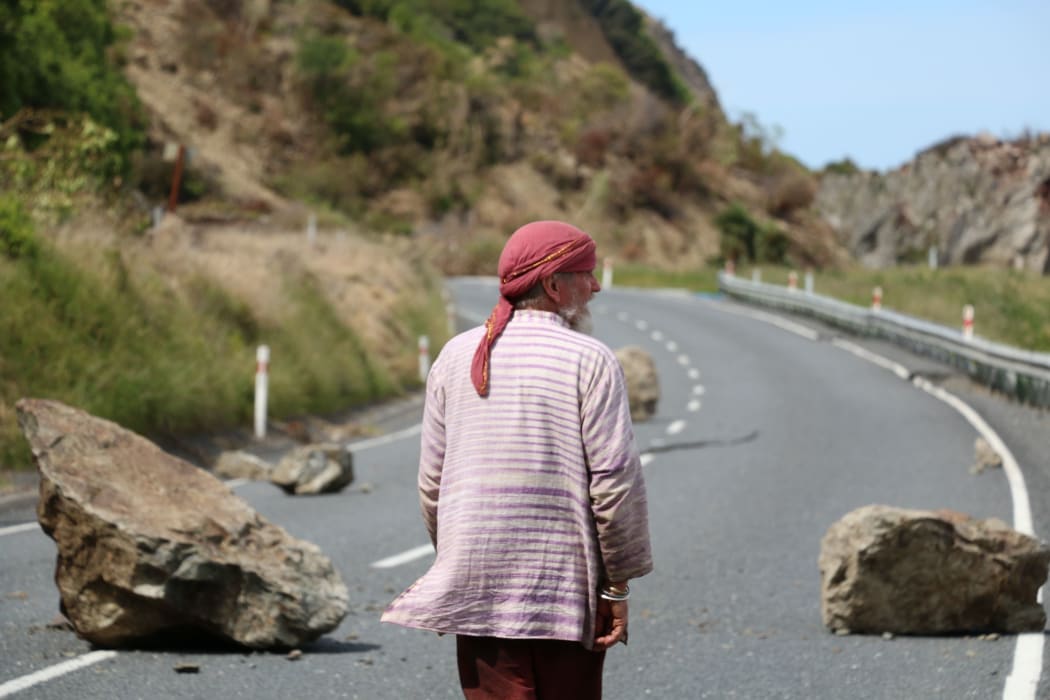 Pete walking down State Highway 1, north of Kaikōura.